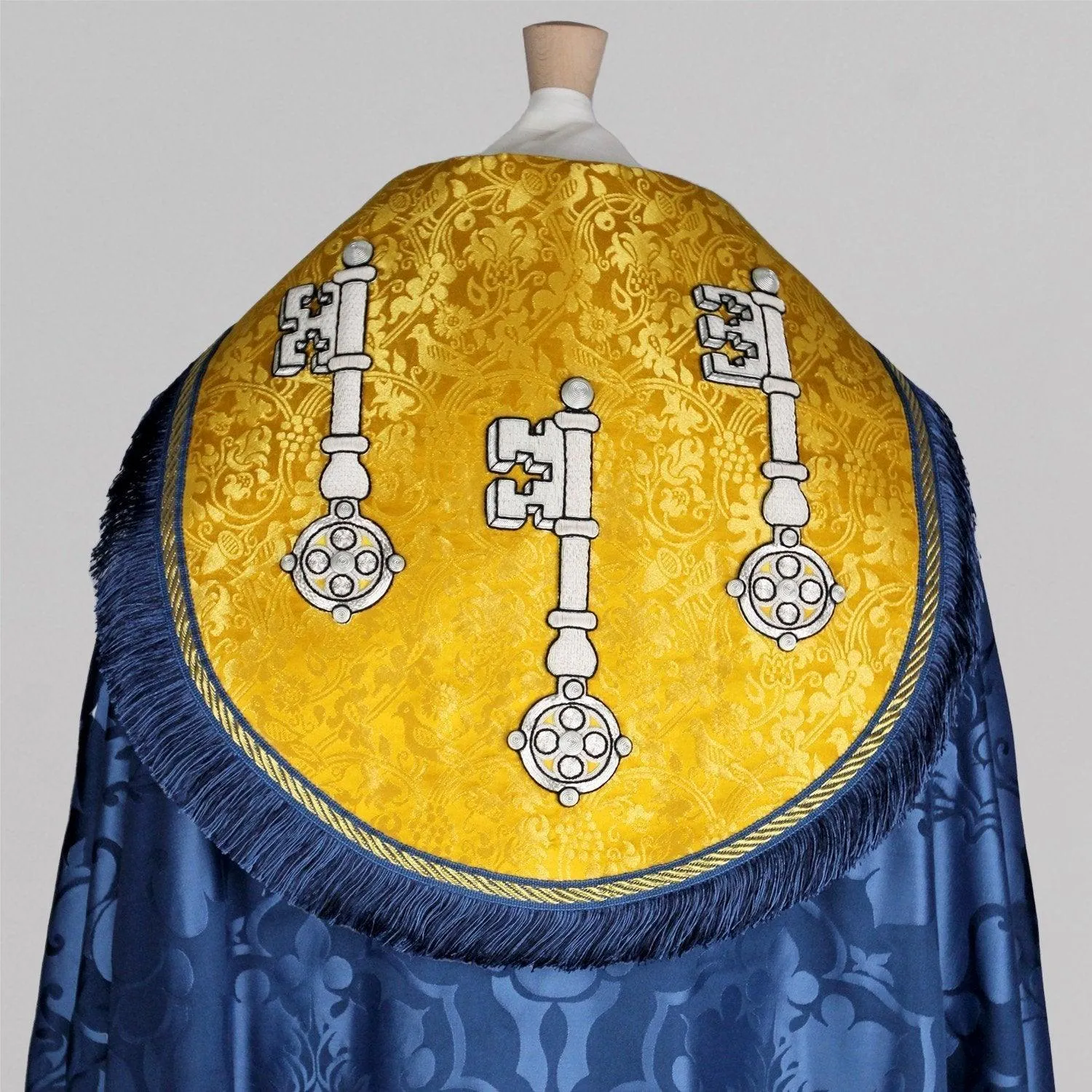 Cathedral Cope in Blue 'Bellini' with Imperial Yellow/Gilt 'Hilliard' Orphreys, Hood, and Morse