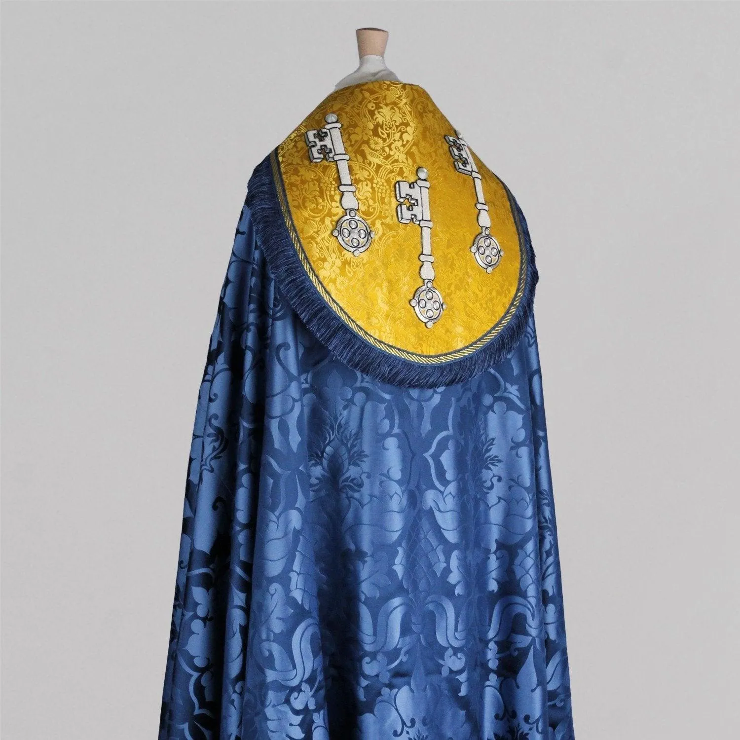 Cathedral Cope in Blue 'Bellini' with Imperial Yellow/Gilt 'Hilliard' Orphreys, Hood, and Morse