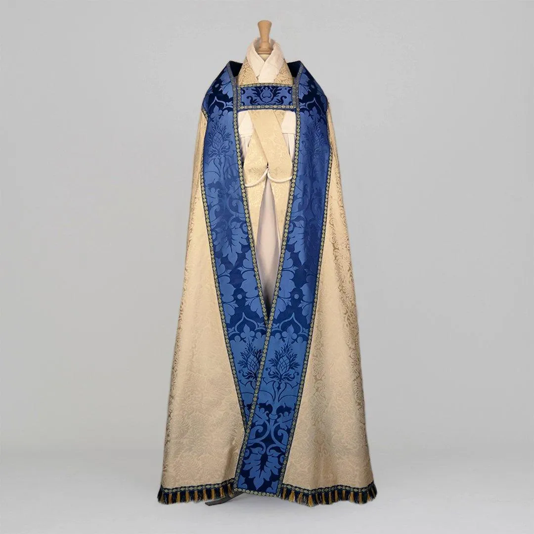 Minster Cope in Cream 'Holbein' with Blue 'Bellini' Orphreys and Sacred/Immaculate Heart Embroidered Hood